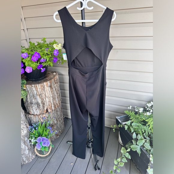 Simons Twik black jumpsuit with cut out back size large - Picture 4 of 9